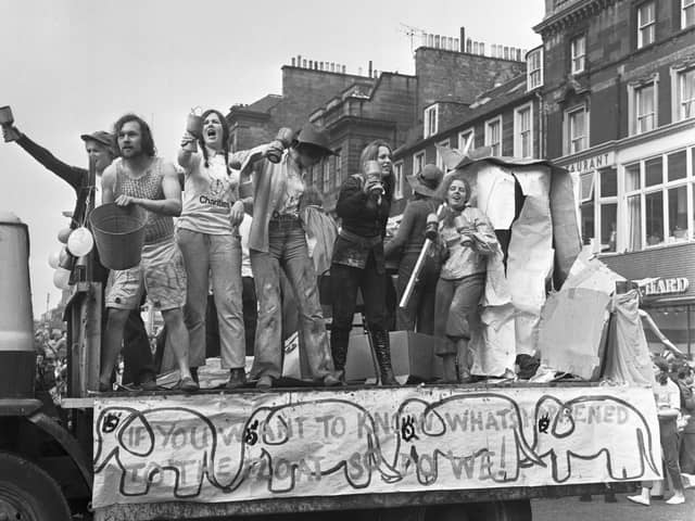 Edinburgh University students hold their annual Charities Week procession along Princes Street in May 1971.