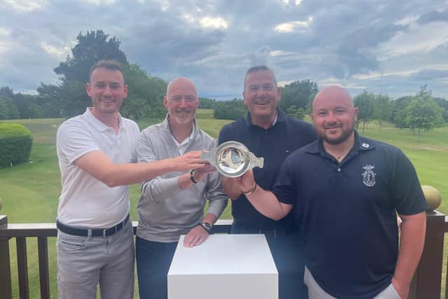 The triumphant Hailes team show off a one-off quaich presented by Alexander Kirkwood & Son to the winners of the 125th Dispatch Trophy