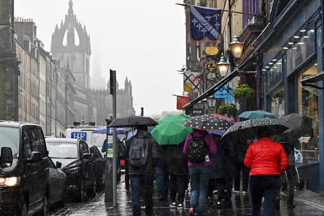 A yellow weather warning has been issued for Tuesday, for rain and snow in parts of Edinburgh, Midlothian and West Lothian.