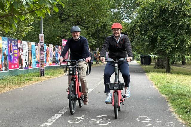 Trying out the new e-bikes at the Meadows: transport convener Stephen Jenkinson (left) and Voi's UK general manager James Bolton. Picture: Neil Johnstone.