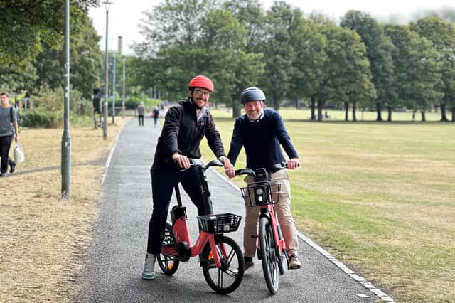 James Bolton and Stephen Jenkinson show off the two different types of e-bike available. Picture: Neil Johnstone