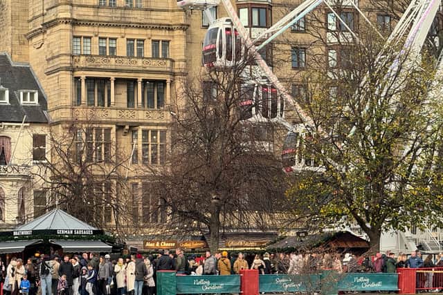 Crowds gather in Princes Street Gardens for the first day of Edinburgh's Christmas market 2025.
