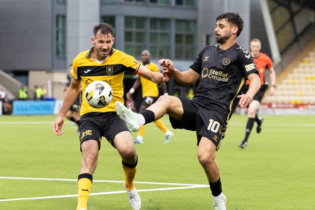 Hearts hero McGowan in action against Hearts last season.