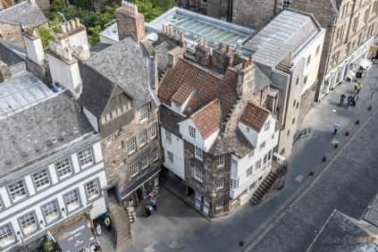 The required works are on the roof of John Knox House in Edinburgh's Old Town, on the Royal Mile.