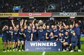 Scotland's captain Sione Tuipulotu raises the Calcutta Cup as Scotland's players celebrate their victory in the Six Nations international rugby union match between Scotland and England at Murrayfield Stadium in Edinburgh, Scotland on February 14, 2026. Scotland won the game 31 - 20. (Photo by ANDY BUCHANAN / AFP via Getty Images)