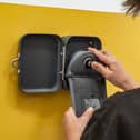 There has been a delay at some schools in installing the magnets  needed to unlock the pouches