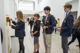 Pupils at Portobello queue up to unlock their phone pouches 
