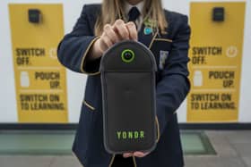 Pupils will have to lock their phones away in pouches all the time they’re at school