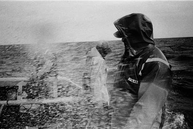 Salmon net fishermen crossing Lunan Bay on the way to fishing bag nets at Auchmithie, Angus, 2002. PIC: Colin McPherson