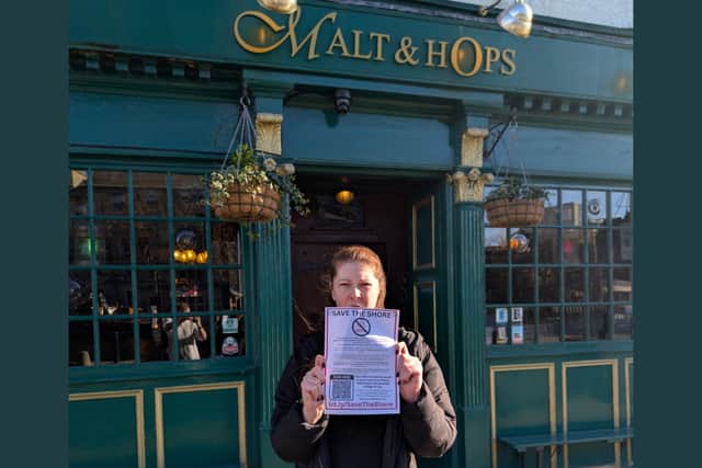 January Watson, Shore Business Collective secretary, outside the Malt & Hops bar at Waterside House