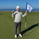 Jack Gallacher celebrates making his first hole-in-one, which came in a game on Gullane No 1