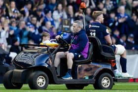 Scotland's Kyle Steyn leaves the field with an injury during a Guinness Six Nations match between Scotland and France at Scottish Gas Murrayfield (Pic: SNS)