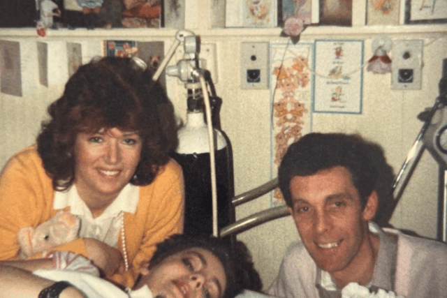   Yvonne with her parents after the accident.