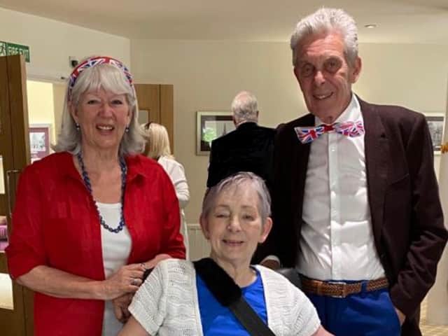 Yvonne with her parents.