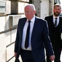 Murrell (left) arriving at Edinburgh High Court