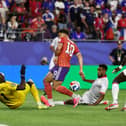 Scotland striker Che Adams was denied by Haiti goalkeeper Johny Placide, before John McGinn pounced on the rebound to score.