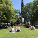 People enjoy the hot weather in Edinburgh