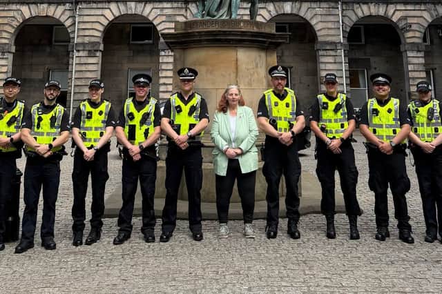 Councillor Margaret Graham alongside some of the new city centre policing unit