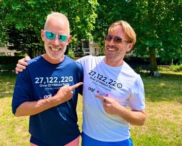 Paul Sinton-Hewitt and Adam Beaumont celebrate 13 years of partnership between aql and parkrun