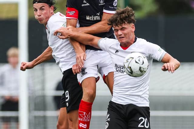 Edinburgh City's Cameron McKinley, Falkirk's Liam Henderson and Edinburgh City's Tommy North (L-R) in action