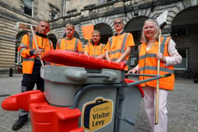 Jane Meagher with a street sweeping team at the City Chambers