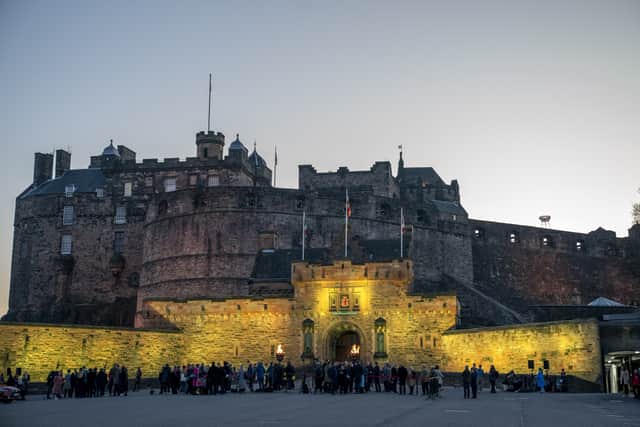 Edinburgh Castle illuminated in yellow light at the 2027 Tour de France launch event (Jane Barlow/PA)