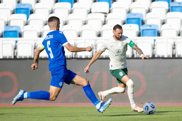 Malisheva's Dreni Kryeziu tries to shut down Hibs' Martin Boyle in Pristina.