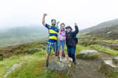  Paul Choat with his daughter Skye and Nicola Roseman CEO of My Name5 Doddie Foundation on Schiehallion in Perthshire.