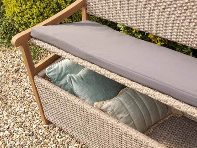 The Rowlinson Alderley Rattan Storage Bench combines comfortable seating with 150 litres of hidden under-seat storage, giving cushions and garden accessories a tidy home.