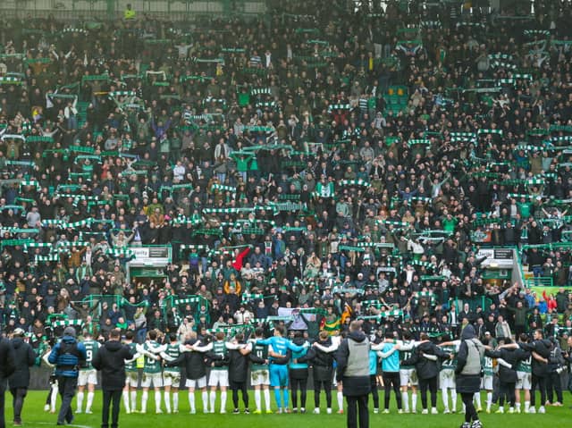 Hibernian players sing Sunshine on Leith at full time during a William Hill Premiership match between Hibernian and Heart of Midlothian at Easter Road