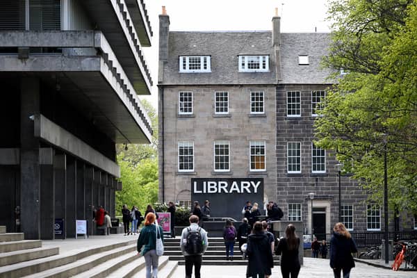 Students outside the University of Edinburgh entrance