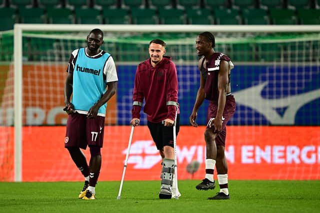 Tom Renaud of Heart of Midlothian with teammates after the UEFA Conference League 2026/27 Play Off Round Second Leg match between SK Rapid and Heart of Midlothian
