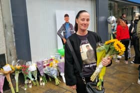 Lisa Petrie outside Barclays funeral directors, close to the spot where her son died in Leith.