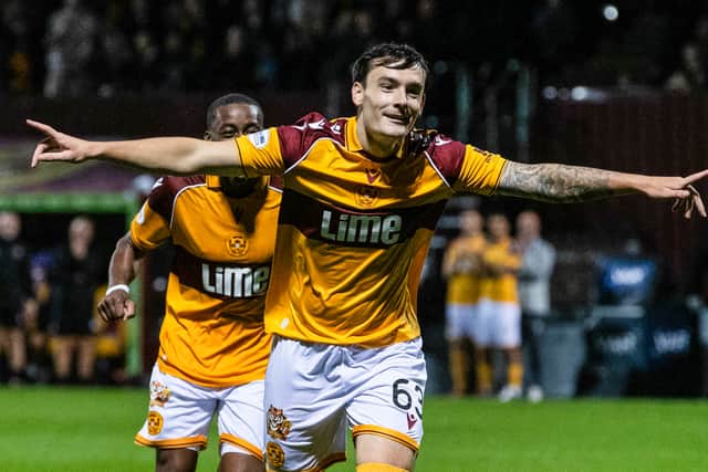 New Motherwell signing Dylan Levitt celebrates after scoring to make it 3-0 against his former club, Dundee United