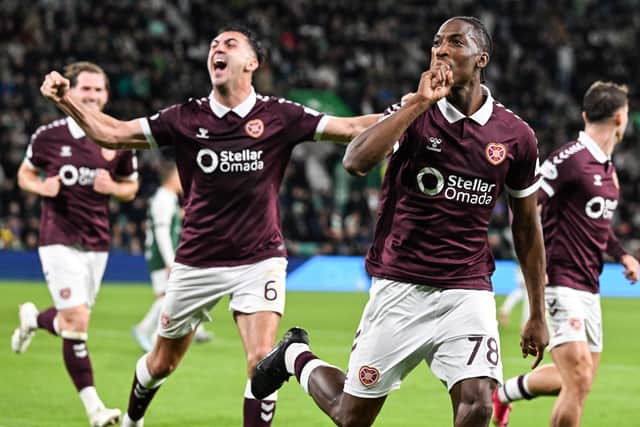 Hearts' Laurent Mendy celebrates scoring to make it 2-0