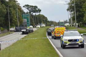 Police have closed the road in both directions between Newbridge and Edinburgh Airport following the crash