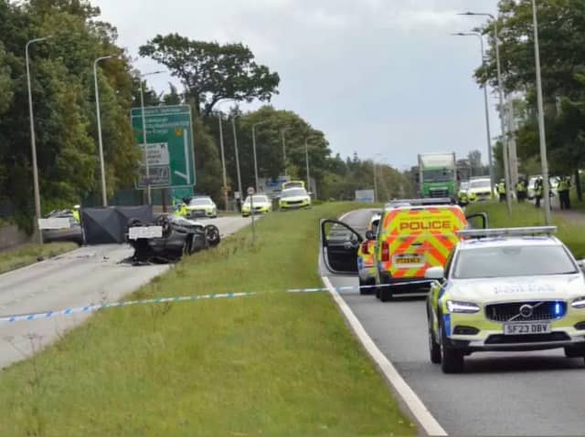 Police have closed the road in both directions between Newbridge and Edinburgh Airport following the crash
