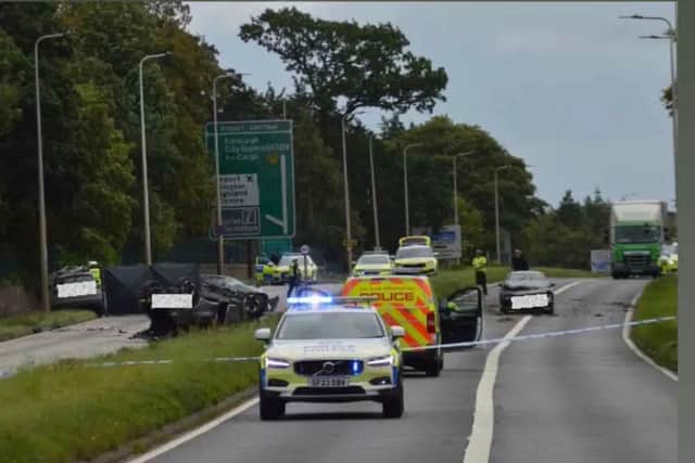 Police on the scene of the crash on the A8 near Edinburgh Airport on Monday.