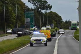 Police are on the scene of a crash on the A8 near Edinburgh Airport