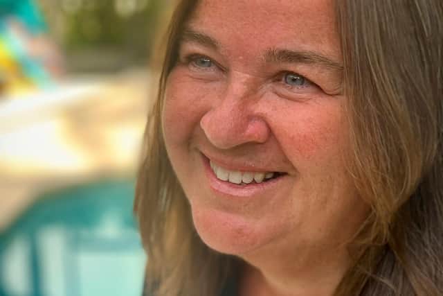 Handout headshot of Linda Patterson smiling