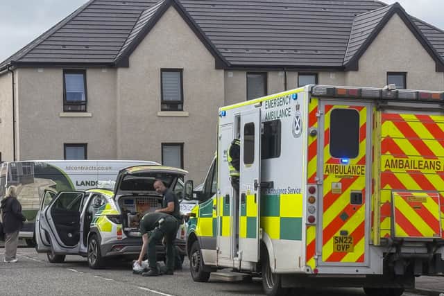 Ambulance crews at the scene.