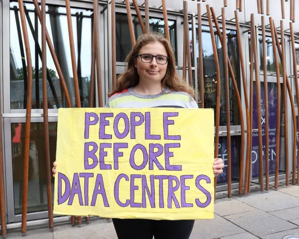 A demonstrator protesting against AI data centres (Danyel VanReenen/AP)