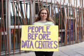 A demonstrator protesting against AI data centres (Danyel VanReenen/AP)