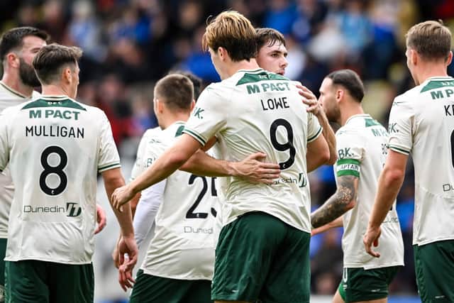 Hibernian's Nathan Lowe (centre) celebrates after scoring to make it 1-1 during a William Hill Premiership match between St Johnstone and Hibernian