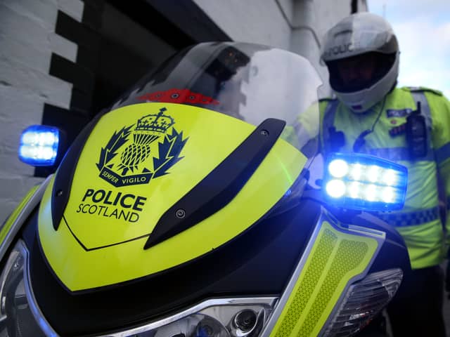 Police Scotland officer and bike