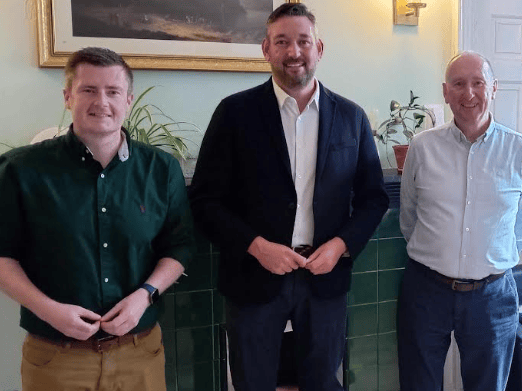 Miles Briggs at Penumbra's Edinburgh Crisis Centre with Shaun Macaulay-Davidson, left, and chief executive Mike Burns, right.
