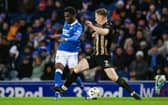 Rabbi Matondo (L) and Annan's Scott Hooper in action during a Scottish Gas Scottish Cup Fourth Round match between Rangers and Annan Athletic