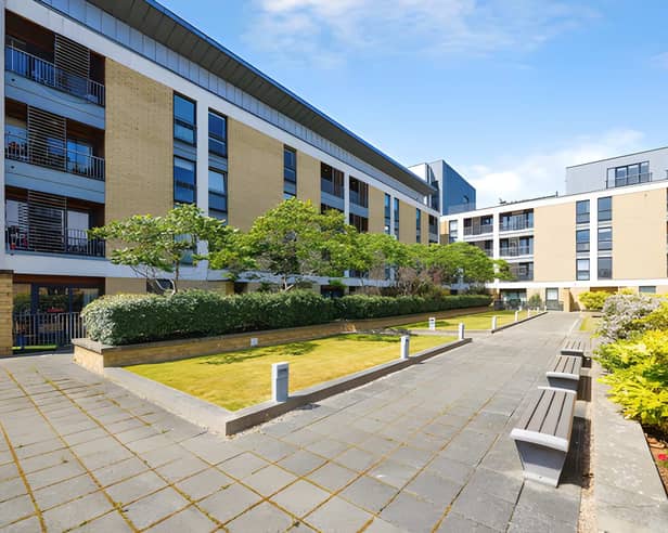 The Kimmerghame Place development provides the setting for The three-bedroom Edinburgh flat on  Kimmerghame Place is on the market for £390,000