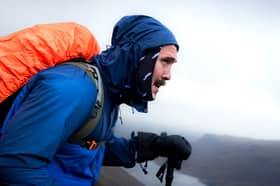 Edinburgh personal trainer Joey Jones, 32, pictured taking on his first mountain yesterday in his MoJoe Moves Mountains challenge.