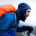 Edinburgh personal trainer Joey Jones, 32, pictured taking on his first mountain yesterday in his MoJoe Moves Mountains challenge.